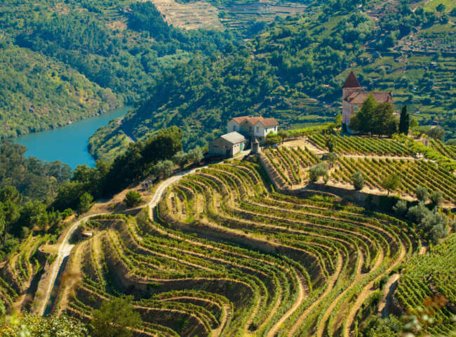 Ariel view of an old building in the Douro Valley river and wine region of Portugal.