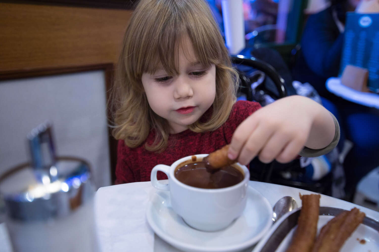 Private chef serving a fine dining meal in Spain, creating an intimate and luxurious culinary atmosphere.