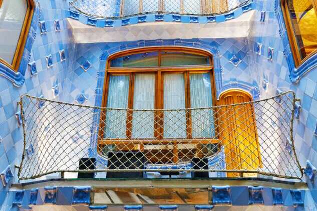 private access Interior view of Casa Batlló in Barcelona, Spain, showcasing Antoni Gaudí’s unique design with curved walls, colorful details, and intricate inner chambers, originally built in 1877 and currently managed by Lluis Sala Sanchez.