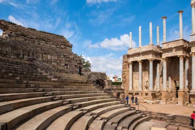 roman Ancient Roman theatre in Mérida, Extremadura, showcasing well-preserved stone seating and arches from the Roman era.