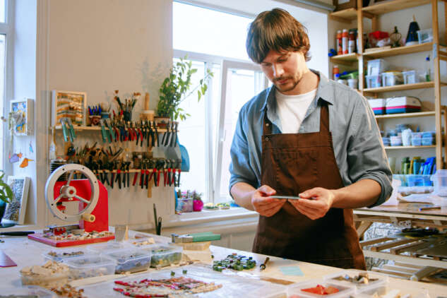 Young,Man,In,Work,Apron,In,Workshop